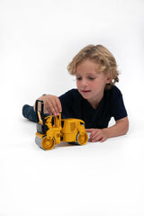 Hand brake details on the Bruder CAT compactor enhance authentic construction-site storytelling.
