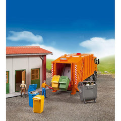 Bruder large silver dumpster on rollers for easy maneuvering in play scenarios