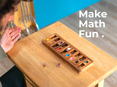 BSIRI Shut The Box family enjoying a cozy game night.