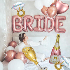 BSRESIN Champagne bottle 43in balloon creates a luxurious backdrop for photos.