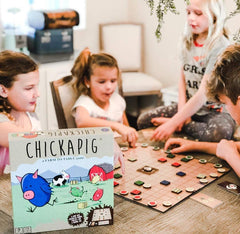 Buffalo Games Chickapig cow figure in action, adding playful chaos to gameplay.