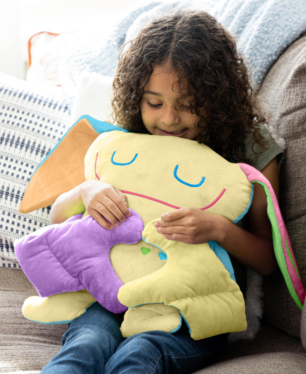 Bumpas weighted plush toy hugging arms, delivering a realistic squeeze for kids.