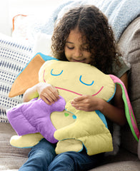 Bumpas weighted plush toy hugging arms, delivering a realistic squeeze for kids.
