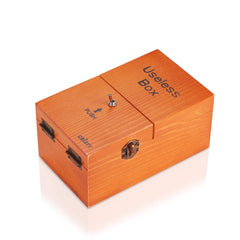 Calary Useless Box push button on natural wood, a playful desk toy offering quick fun.