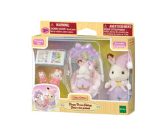 Calico Critters Sleepy Dream Siblings: Puppet on the girl's hand for interactive storytelling.