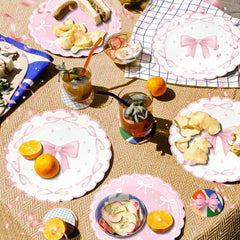 CANREVEL plates and napkins in bright colors elevate decor.