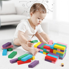 Canuan family play session with wooden blocks supporting cooperative problem solving.