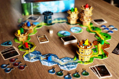 Capstone Games Wandering Towers wizard meeples ready for Ravenskeep chase.