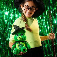 Care Bears Elphaba belly badge close-up; showcases collector detail.