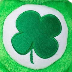 Green Good Luck Bear face with a friendly smile and soft fur texture.