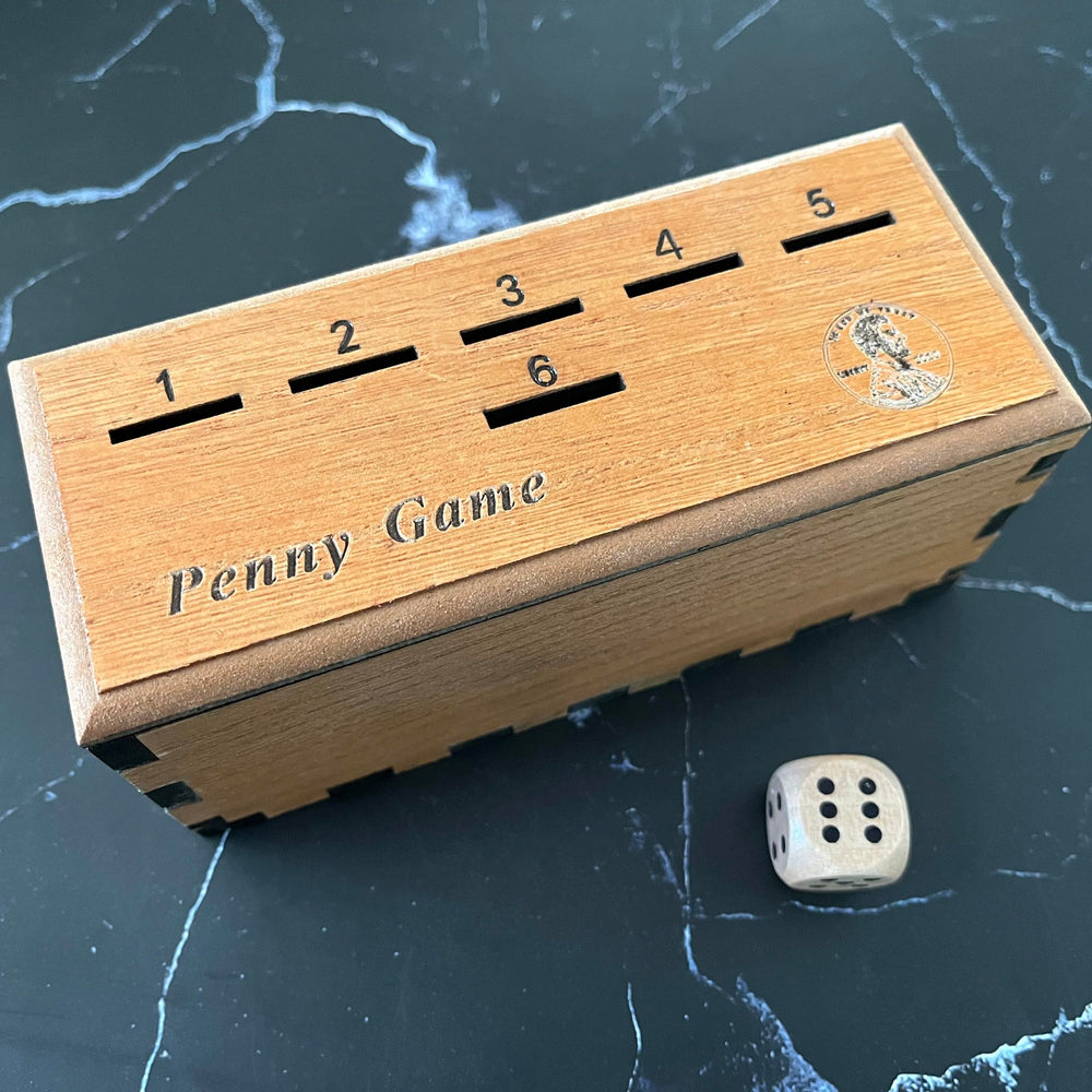CBLKUS Penny Game box open, inviting quick family play and easy setup.
