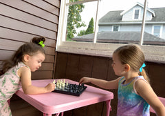 Chess Armory includes two extra queens for flexible play