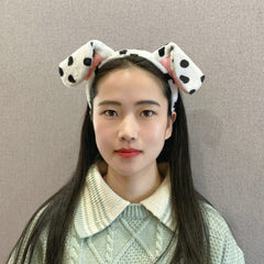 CHEU dalmatian ears headband worn by a child at a party