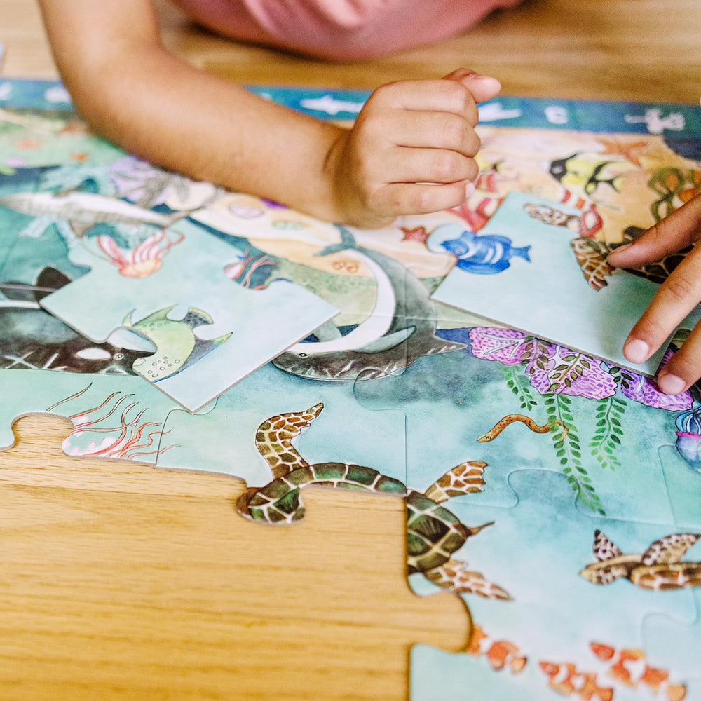 Child places pieces to build hand-eye coordination