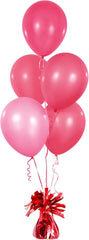 Chochkees Red balloon weights centerpiece setup anchors balloons for eye-catching tables.