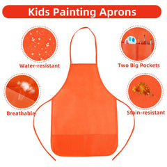 CHRORINE apron worn by toddler during painting activity.