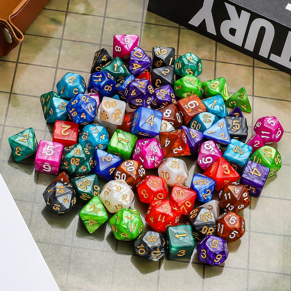 CiaraQ colorful dice set spread on a tabletop for RPG sessions.