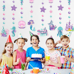 Cindeer pink green purple mermaid decor brings vibrant party atmosphere.
