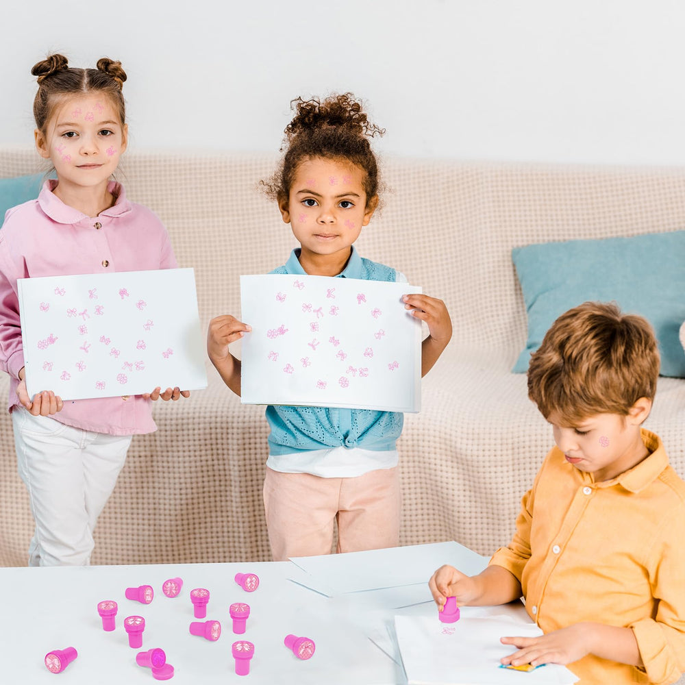 Classroom prizes decorated with Cinrobiye pink bow stampers.