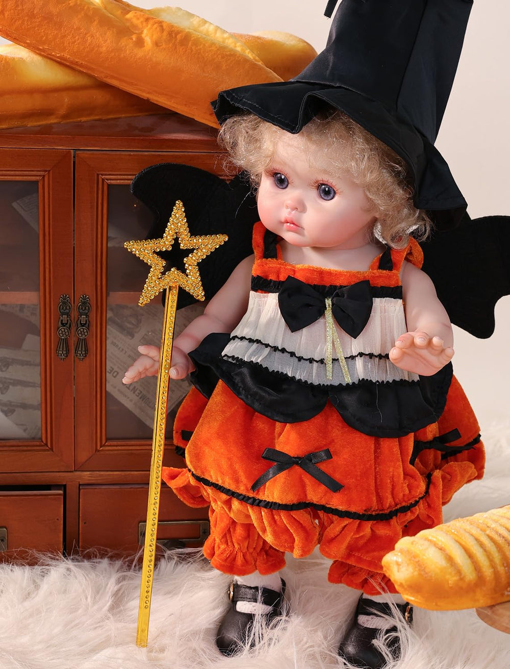 Cloveray bat wings accessory boosts Halloween display appeal on Cloveray doll.