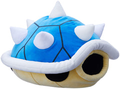 Spiny Shell character used as desk decor and cozy companion.