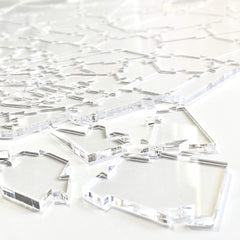 Edge-detail of CM Originals Broken Glass Puzzle emphasizing unique shapes.