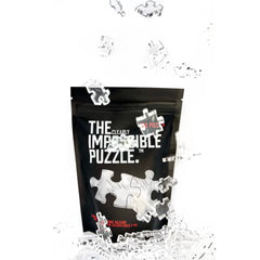 CM Originals Clearly Impossible Puzzle size reference, 18.75 by 11 inches for table setup.