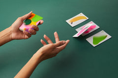 CMYK Fruit Fight Magenta Edition close-up shows vibrant illustrations for immersion.