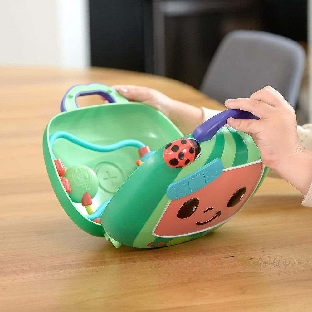 CoComelon carry case open showing organized tools for on-the-go play