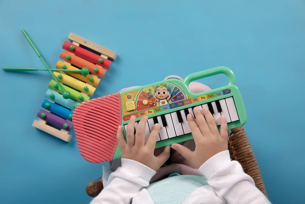 CoComelon keyboard with carry-n-go handle for portable play