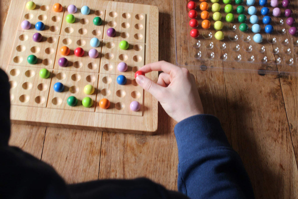 ColorKu puzzle cards displayed with the holder for quick setup and reference