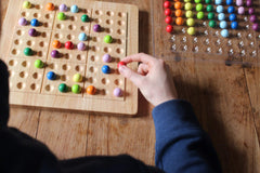 ColorKu puzzle cards displayed with the holder for quick setup and reference