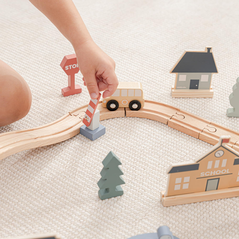 Kid-friendly pieces from the Comfy Cubs wooden train set for safe exploration