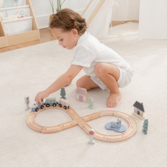 Comfy Cubs wooden train bridges, trees, and signs enhance storytelling and spatial awareness.