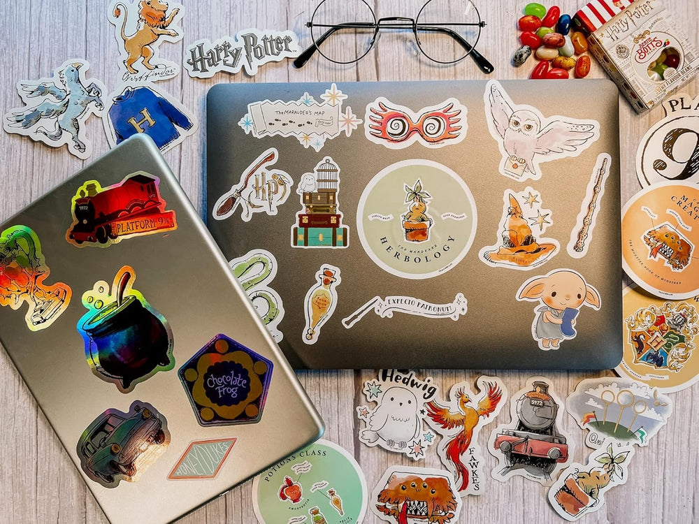 CON*QUEST Hogwarts Express watercolor sticker with hologram enhances laptops.