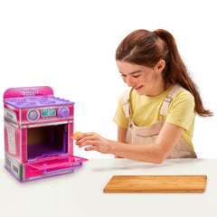 Cookeez Makery oven ding signals a playful bake reveal for kids.