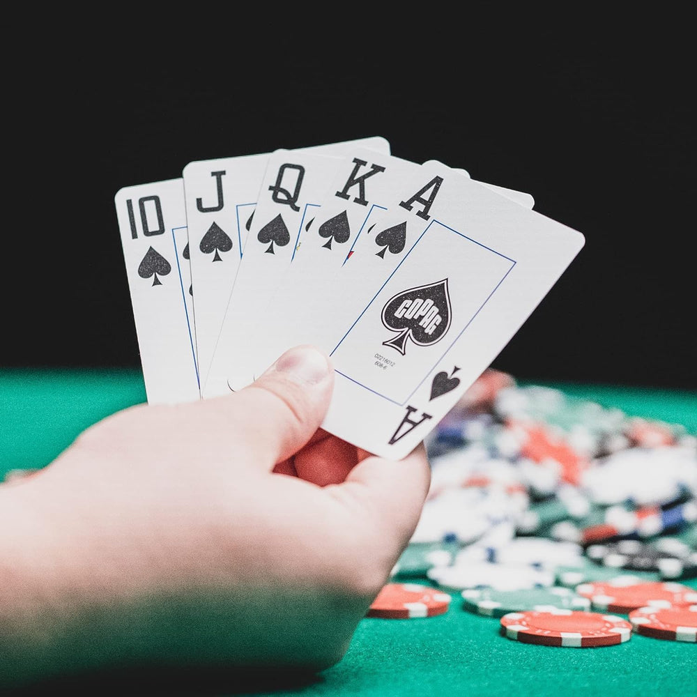Copag WSOP poker-size cards in red and blue design for easy table reading.