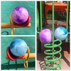CORECISE Marbleized Bouncy Ball set arranged for a playful group activity outside.