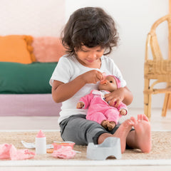 Corolle baby doll care potty realistic, encourages pretend potty training.