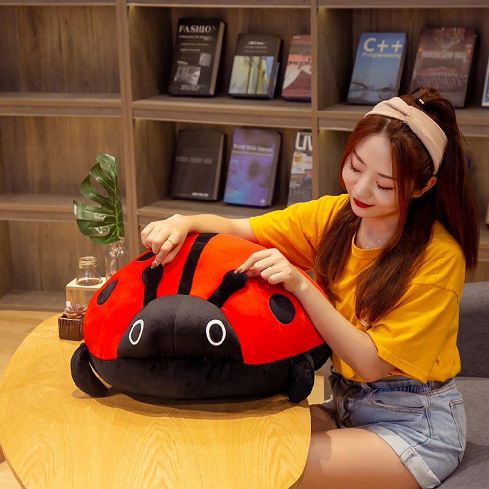 COSGOO cute ladybug plush toy doubles as lumbar support during work