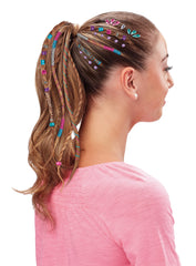 Cra-Z-Art kid using the styler enjoying a creative playtime