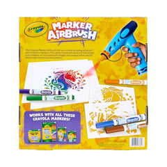 Airbrush in action showing downward spray for controlled effects