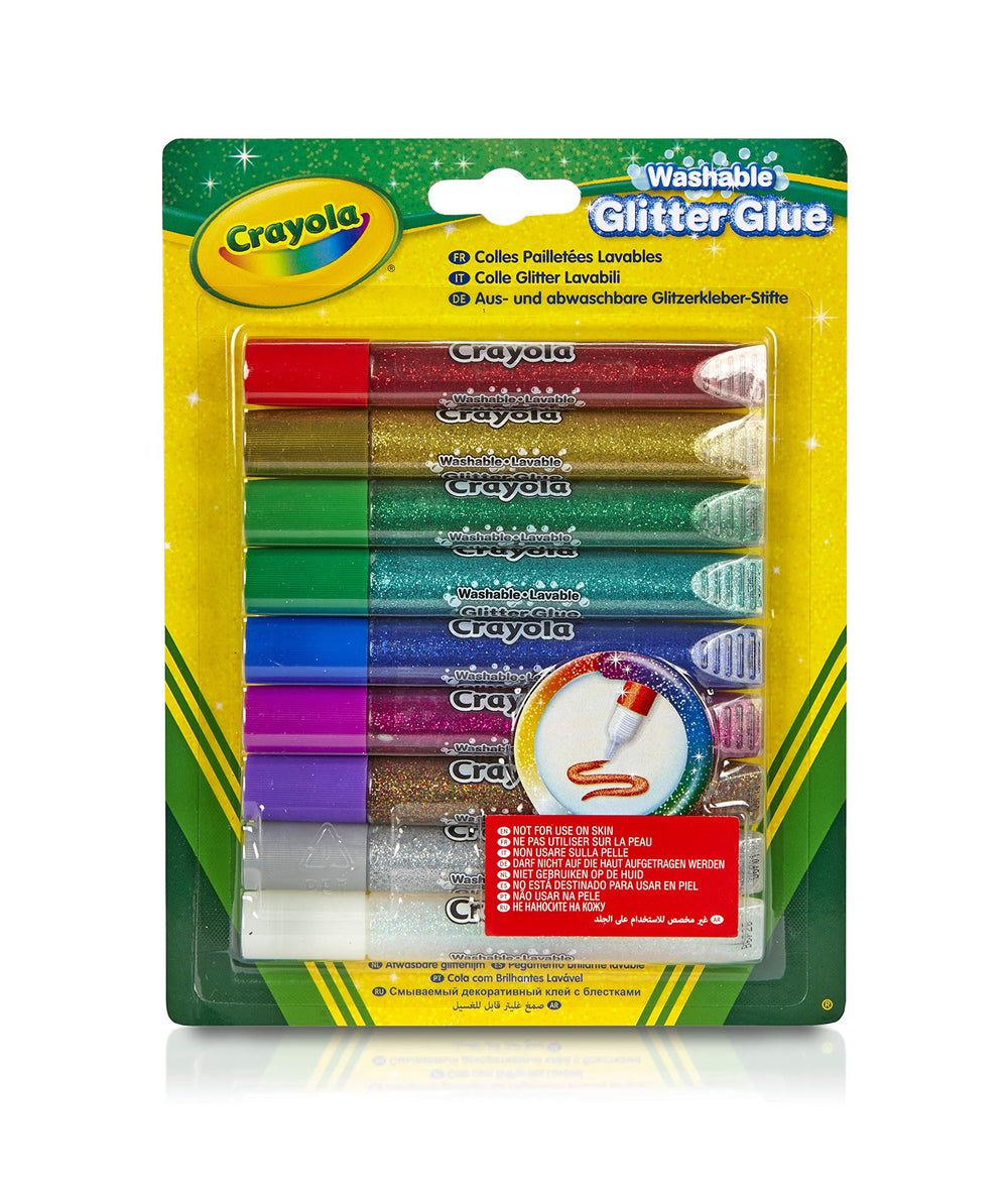 Crayola glitter glue pen in gold shines on paper for festive cards.