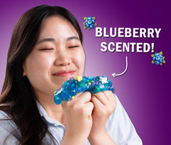 Crazy Aaron's Slime Charmers Cosmic Matter blue water slime stretch and pull for sensory exploration