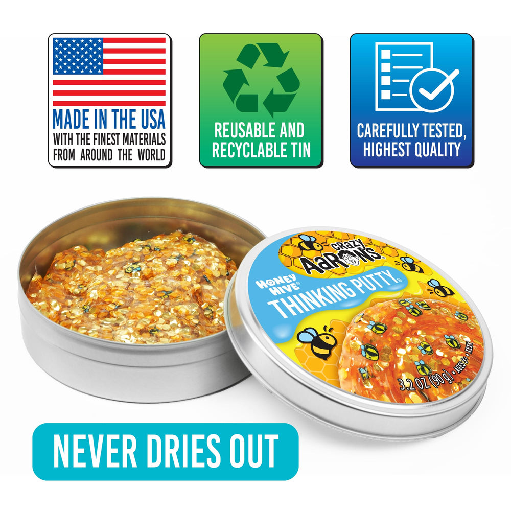 Crazy Aaron's Honey Hive putty on desk promotes focused play.