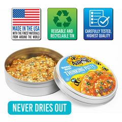 Crazy Aaron's Honey Hive putty on desk promotes focused play.