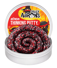 Crazy Aaron's Ninja Thinking Putty in black glitter, perfect for tactile play.