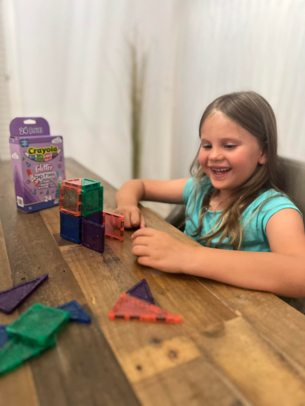 Bright glitter colors of Crayola PIP-Tiles aid color recognition and pattern play.
