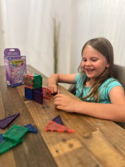 Bright glitter colors of Crayola PIP-Tiles aid color recognition and pattern play.