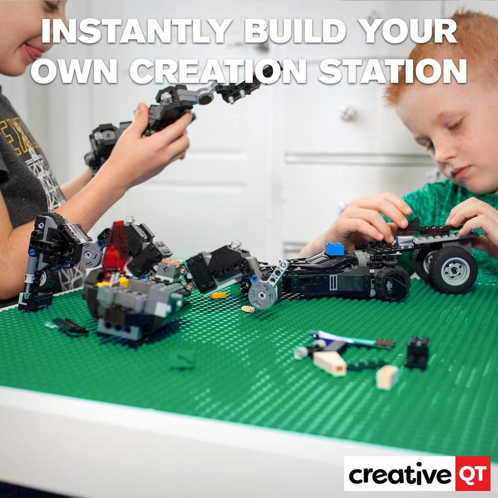 Creative QT baseplates on table providing instant play space for kids.